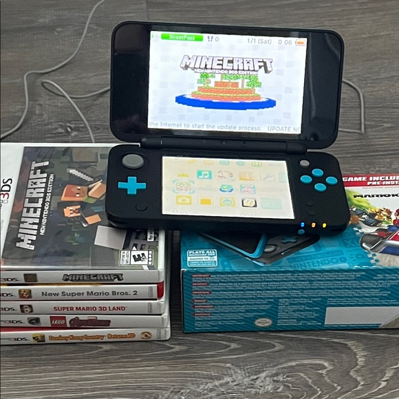 Nintendo 2DS XL Black and Teal Handheld Console with games